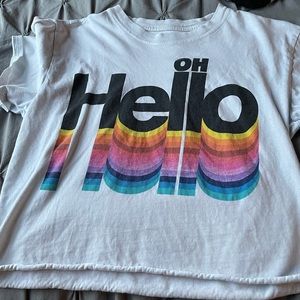 A white crop top with "Oh Hello" and a rainbow